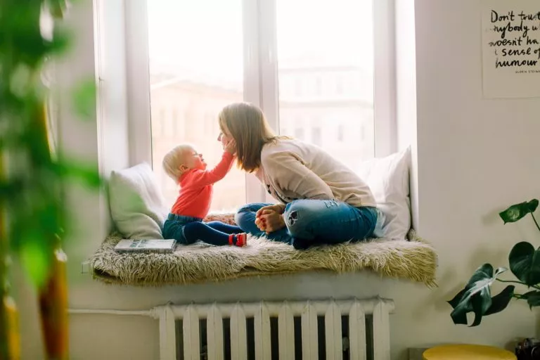 Mother-and-son-smiling-at-each-other.webp